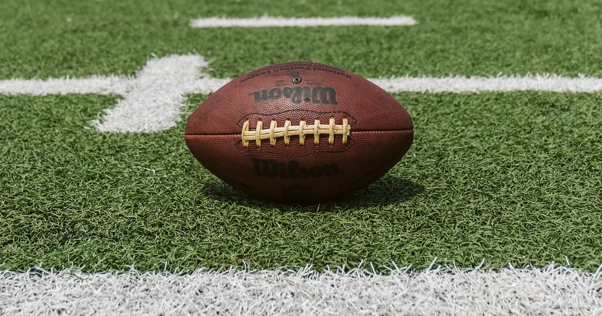 For Facebook: A Football Sits on the Green