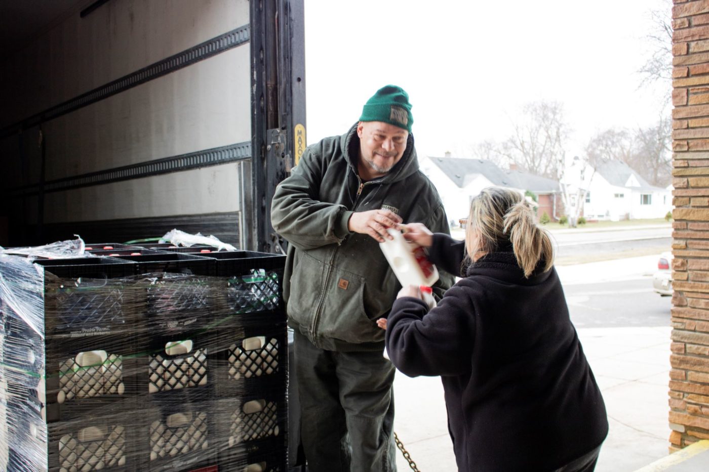 Gleaners staff distributes fresh milk at a School Food Mobile at McKinley Elementary School