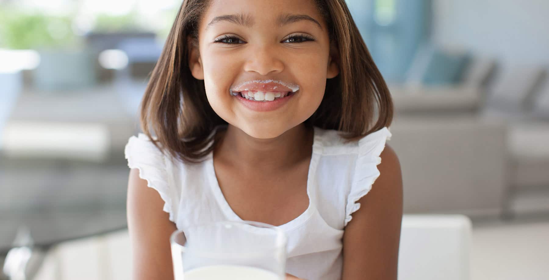 Little Girl with a Milk Mustache