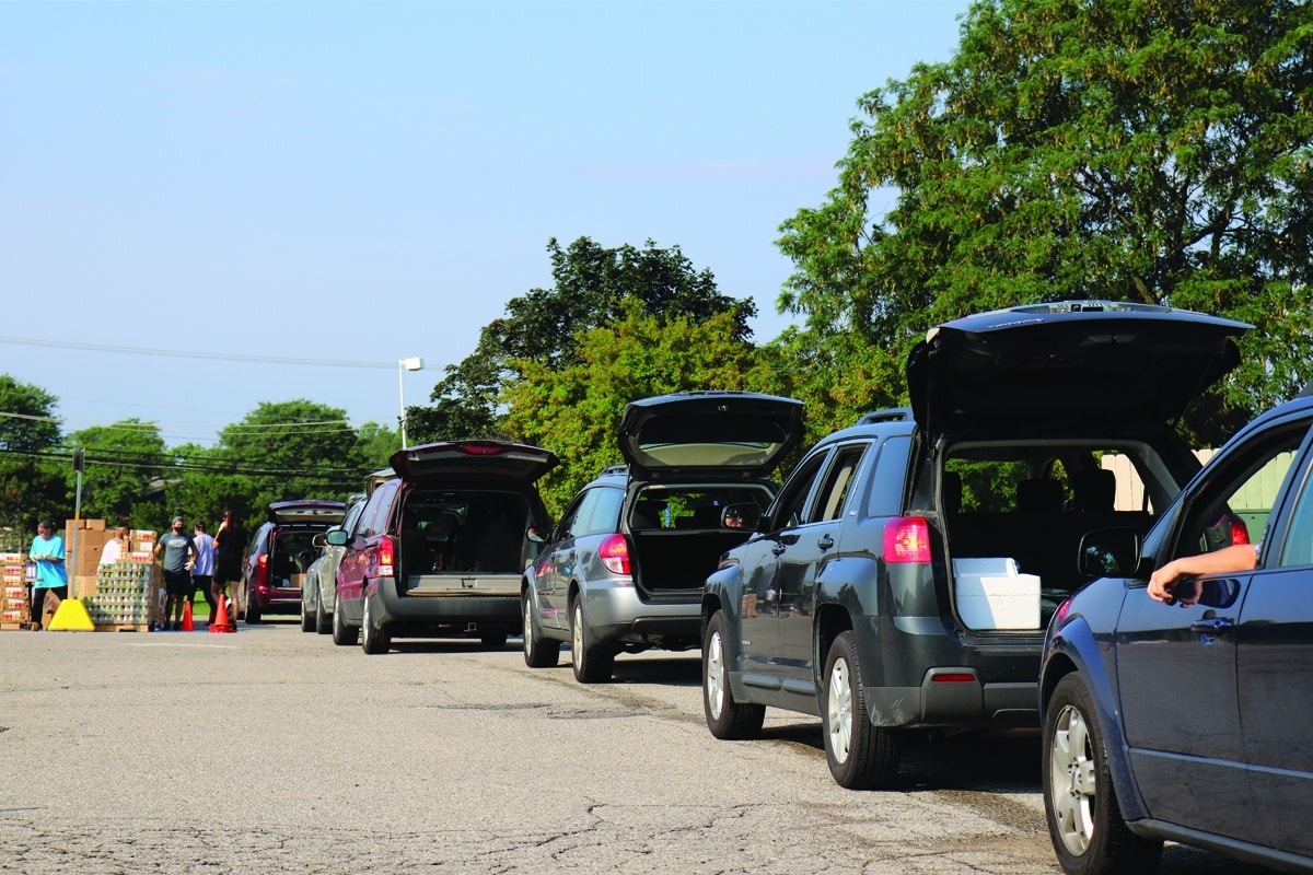 Car lined up for a community mobile distribution