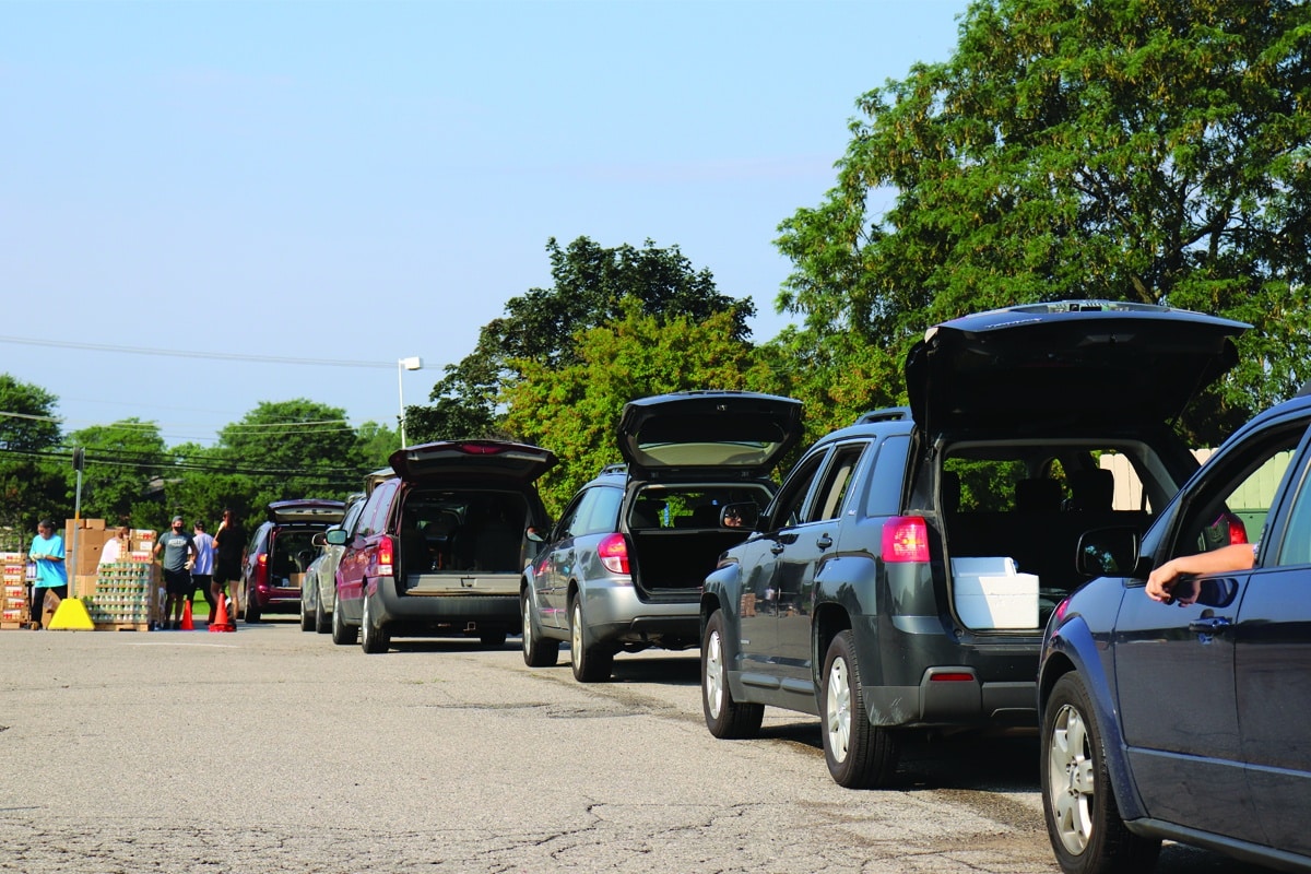Car lined up for a community mobile distribution
