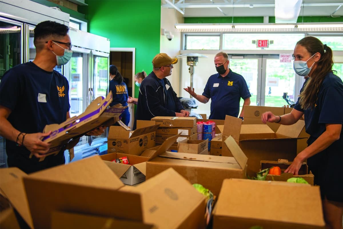 Volunteers sorting food
